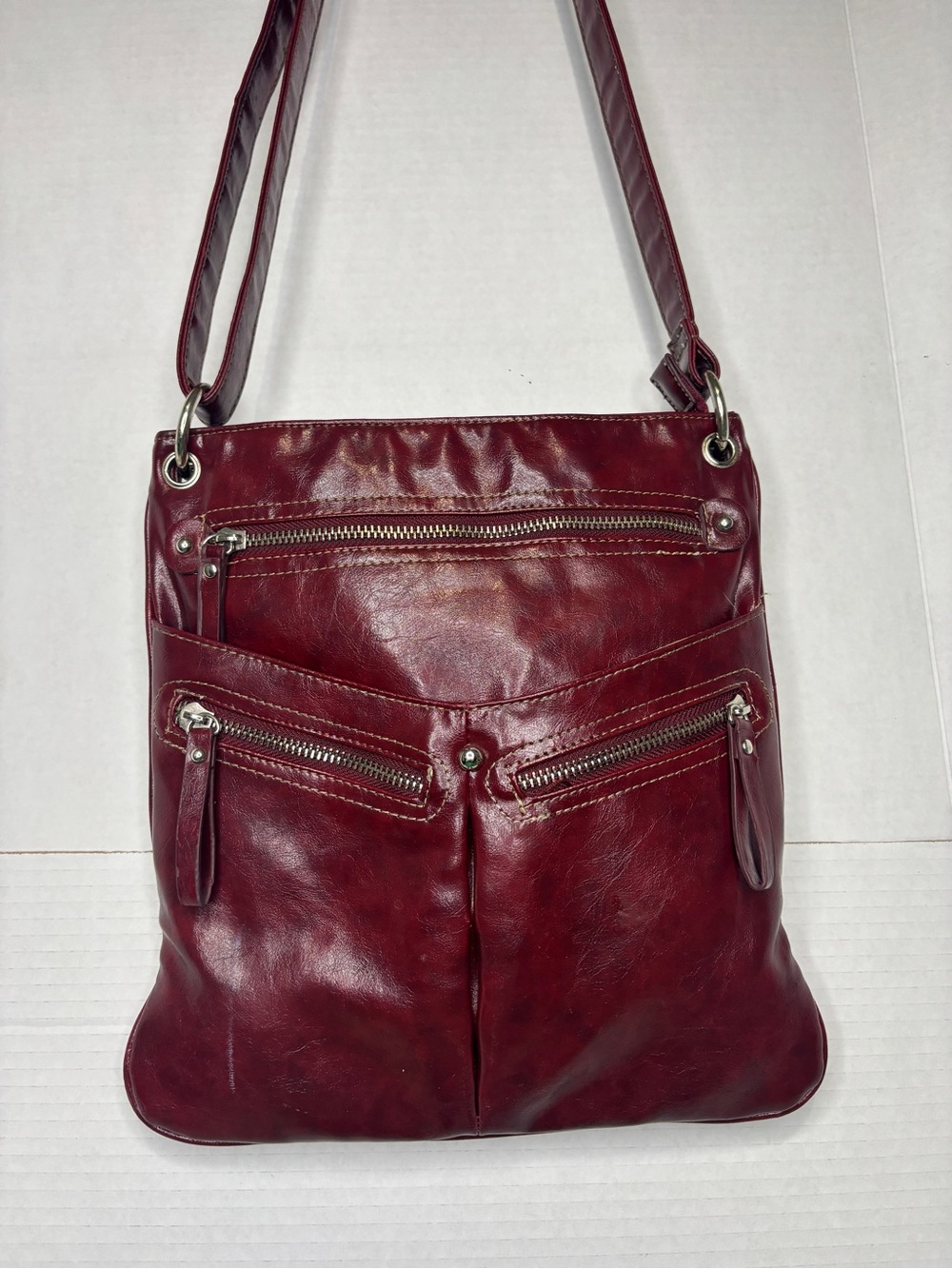 Jessica Burgundy Faux Leather Crossbody Bag Angle Zipper Pocket Details FLAWED